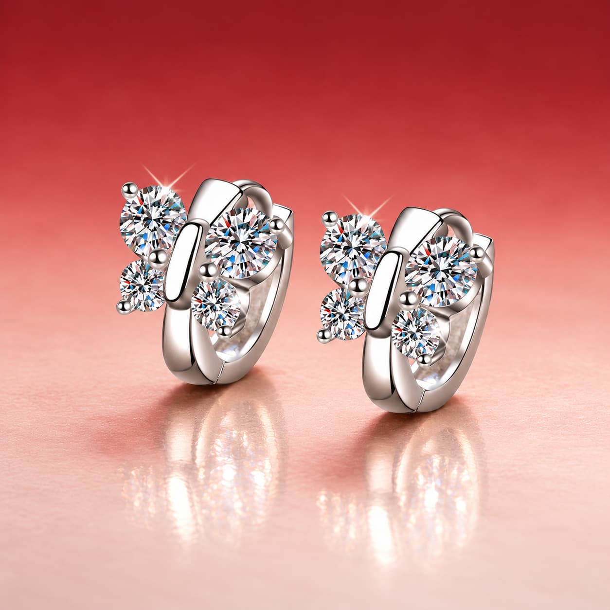 Luna Series · Butterfly Huggie Earrings — Sterling Silver — image 1