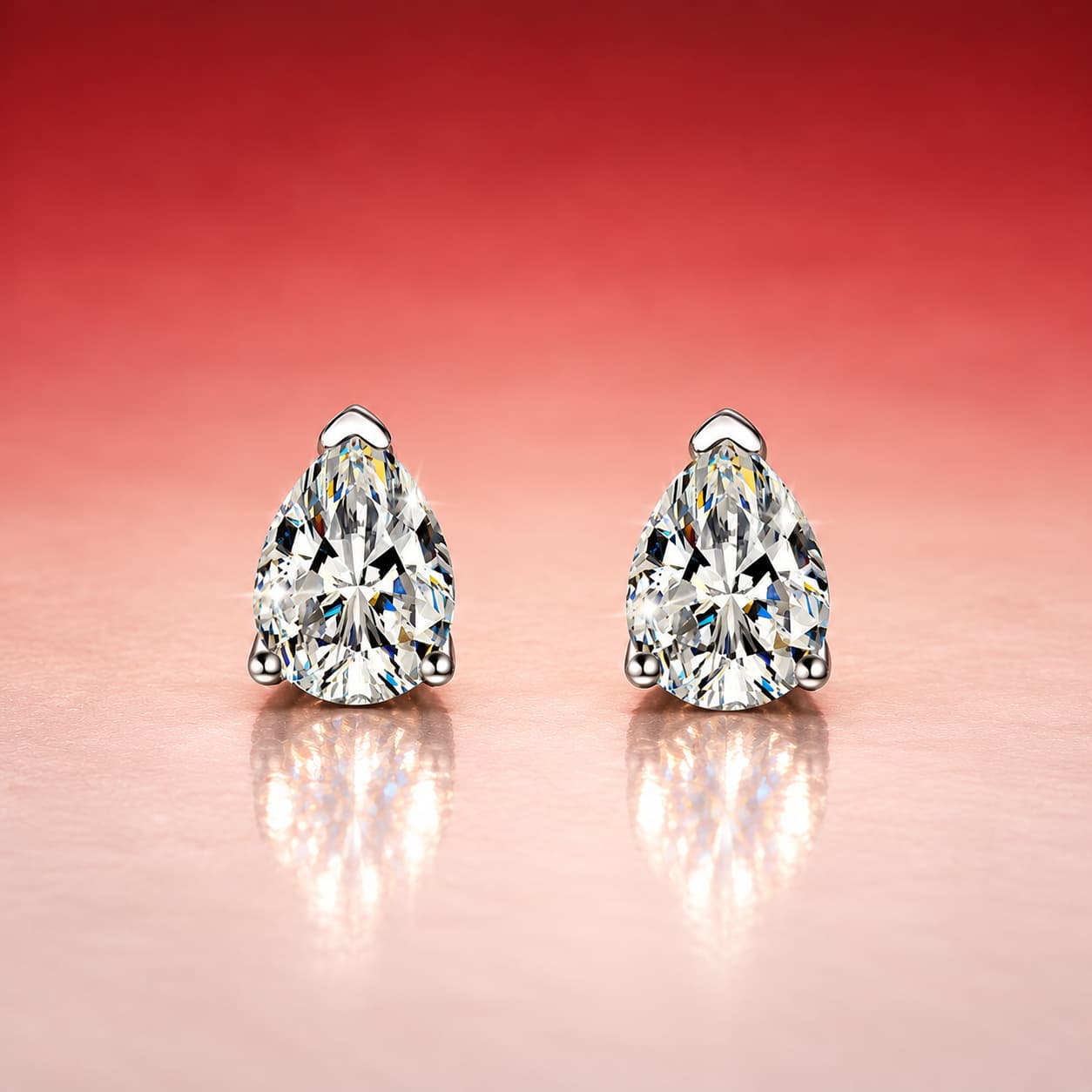Luna Series · Pear-Cut Solitaire Stud Earrings — Sterling Silver — image 1