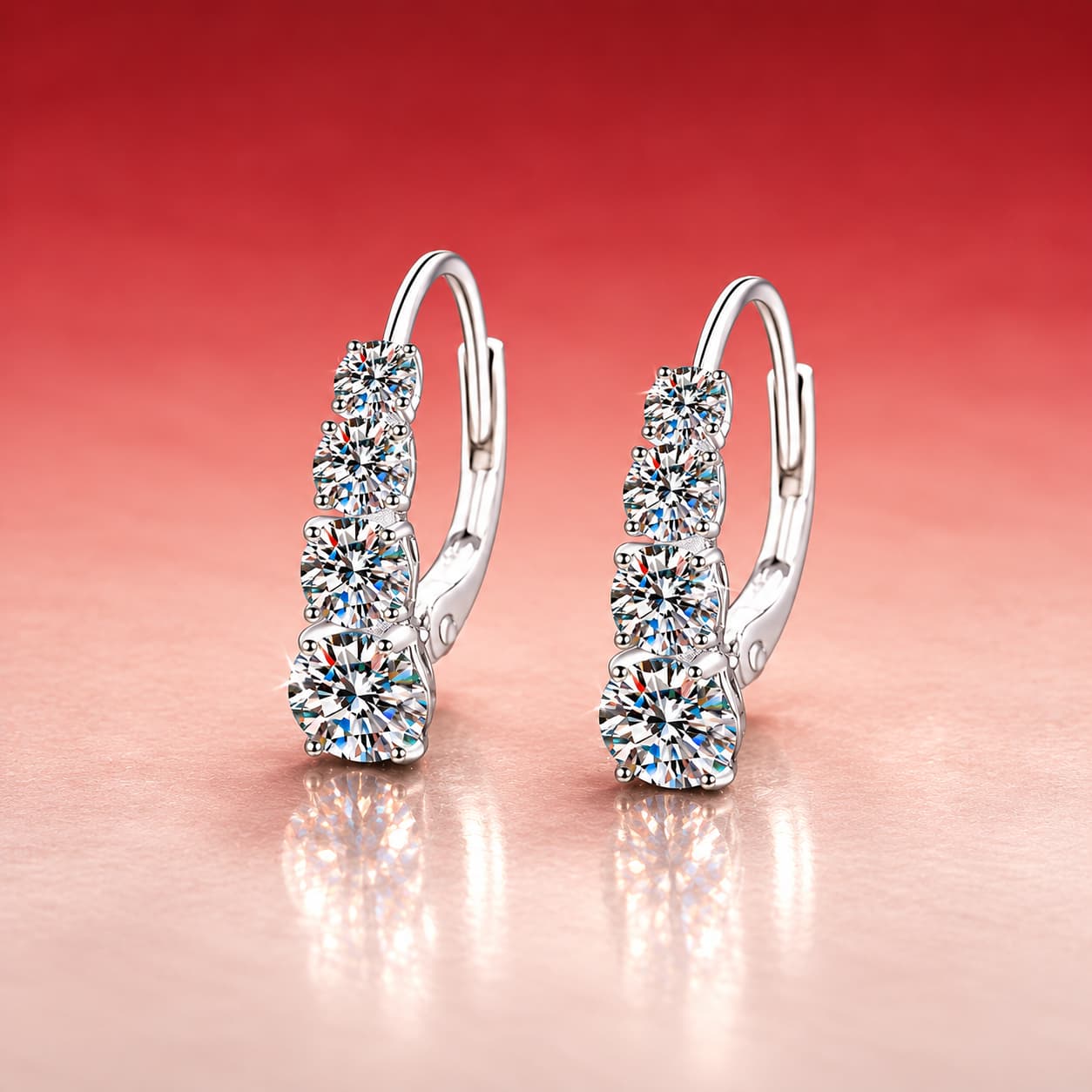 Graduated Four-Stone Huggie Earrings — 925 Sterling Silver — image 1