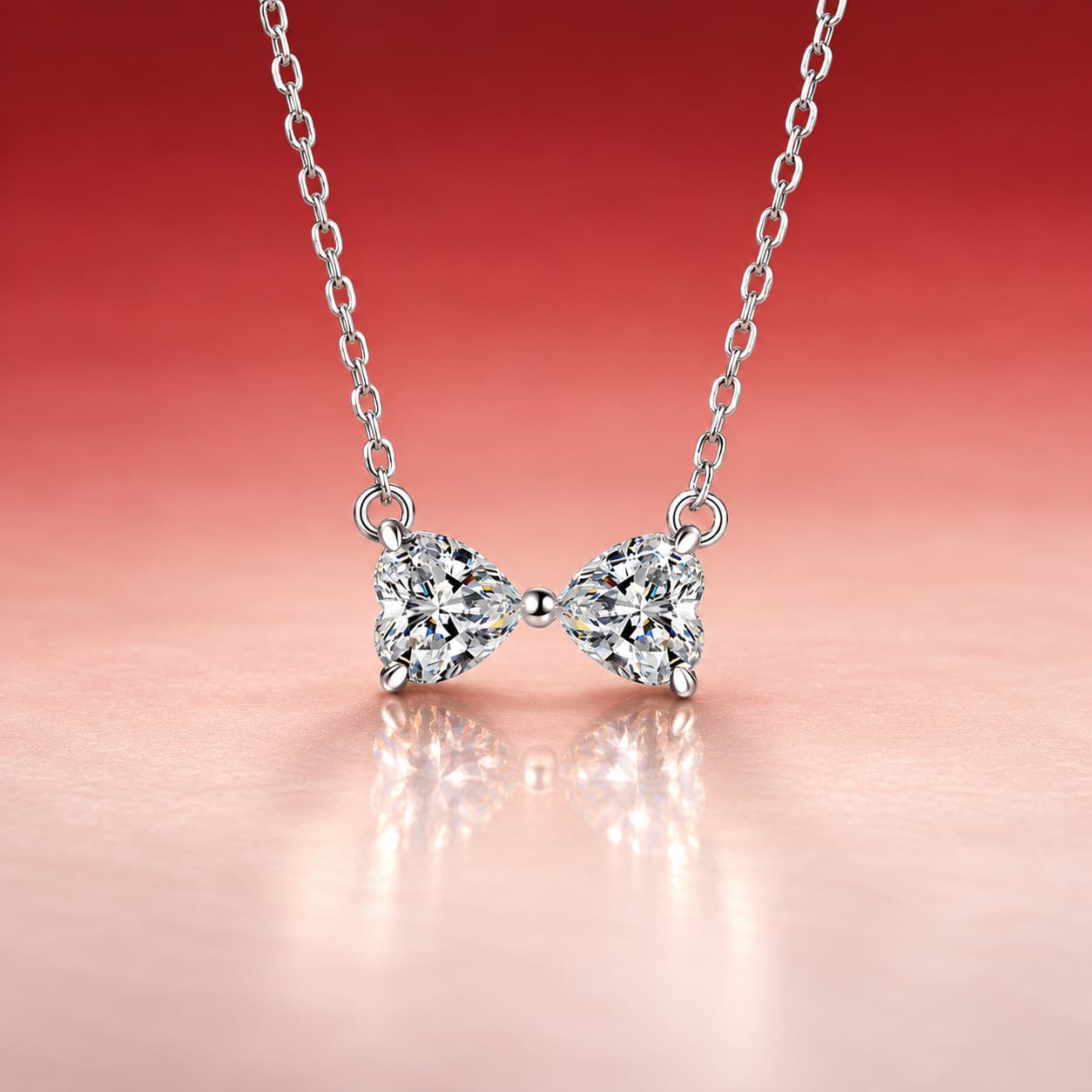 Luna Series · Bow-Tie Double-Heart Necklace — Sterling Silver — image 1