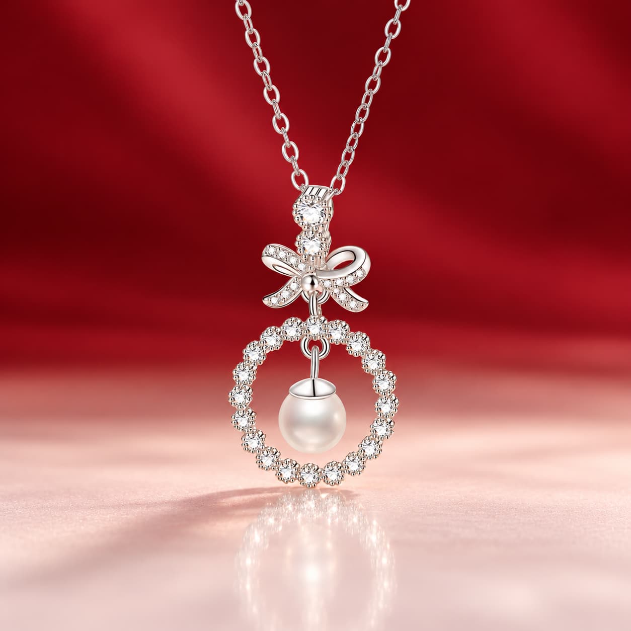 Luna Series · Bow and Pearl Halo Pendant Necklace — Sterling Silver — image 1