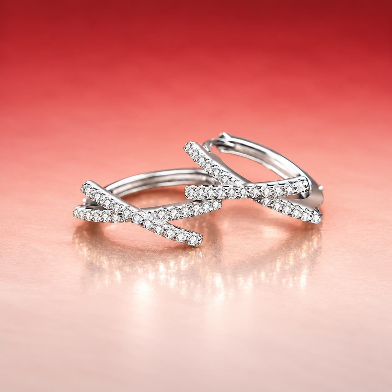 Luna Series · Crossed Pavé Huggie Earrings — Sterling Silver — image 4
