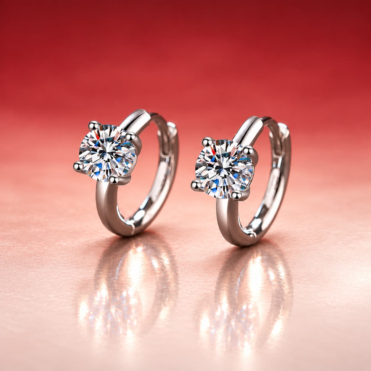 Luna Series · Four-Prong Solitaire Huggie Earrings — Sterling Silver — image 1